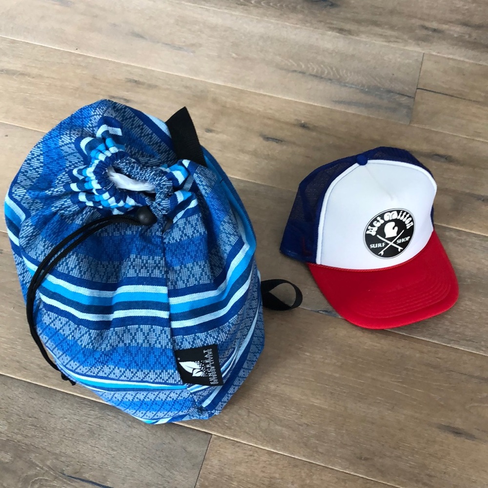 Wet Mitten Surf Shop Trucker Hat and SunCreat Sling Bag